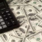 http://www.dreamstime.com/royalty-free-stock-photos-money-u-s-dollars-calculator-studio-shot-image30385848