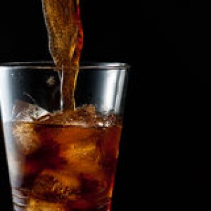 http://www.dreamstime.com/stock-photos-cola-pouring-iced-glass-image23076983